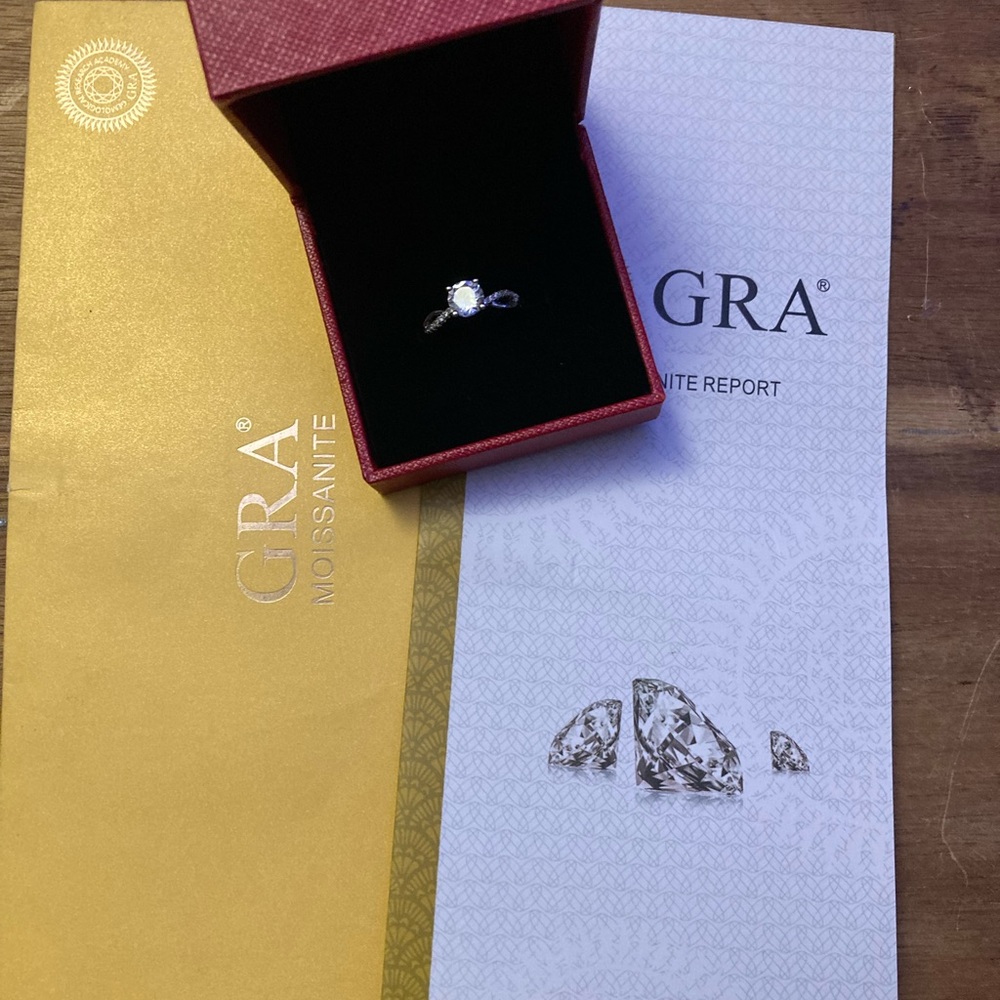 Sterling silver engagement ring with paperwork